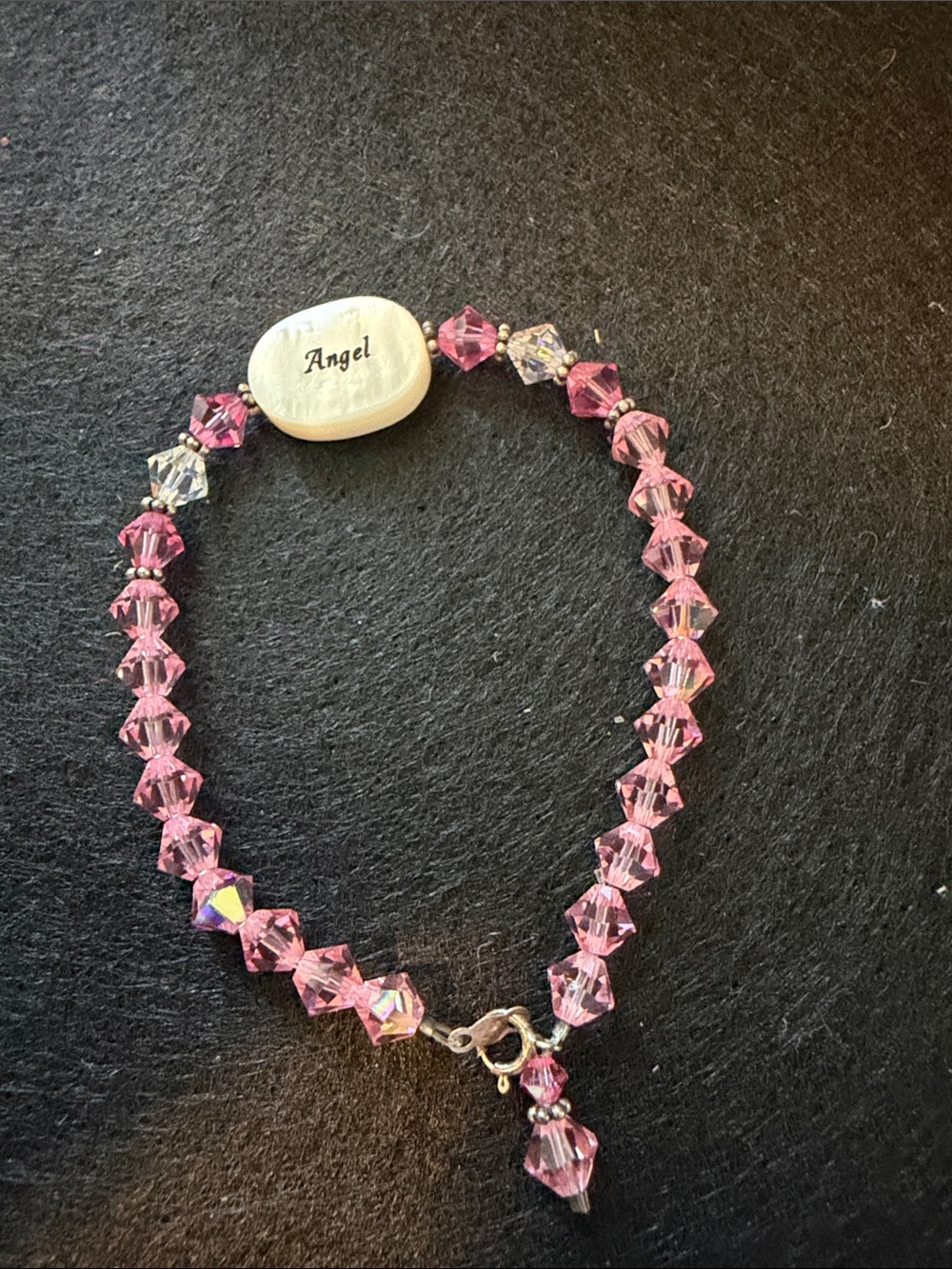 Swarovski Pink Crystal Bracelet with 'Angel' Accent. Sterling Silver Spacers